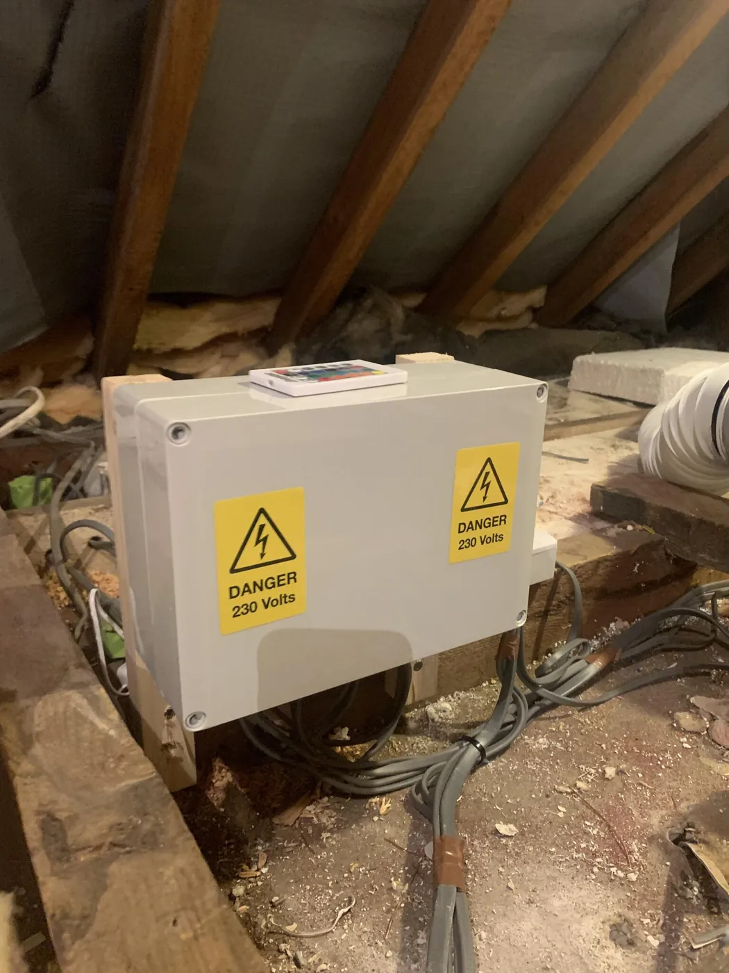 Junction enclosure installed in a loft